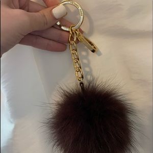 Michael Kors puff keychain.